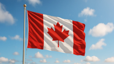 Canadian flag waving in the blue sky, symbolizing hope and unity