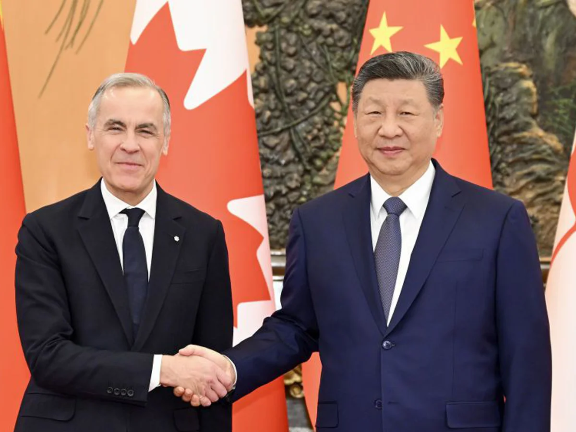 国家主席习近平在北京会见来华进行正式访问的加拿大总理卡尼